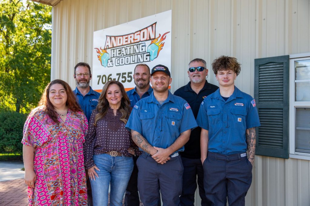 The Anderson Heating & Cooling team in front of the shop in Thomson, GA